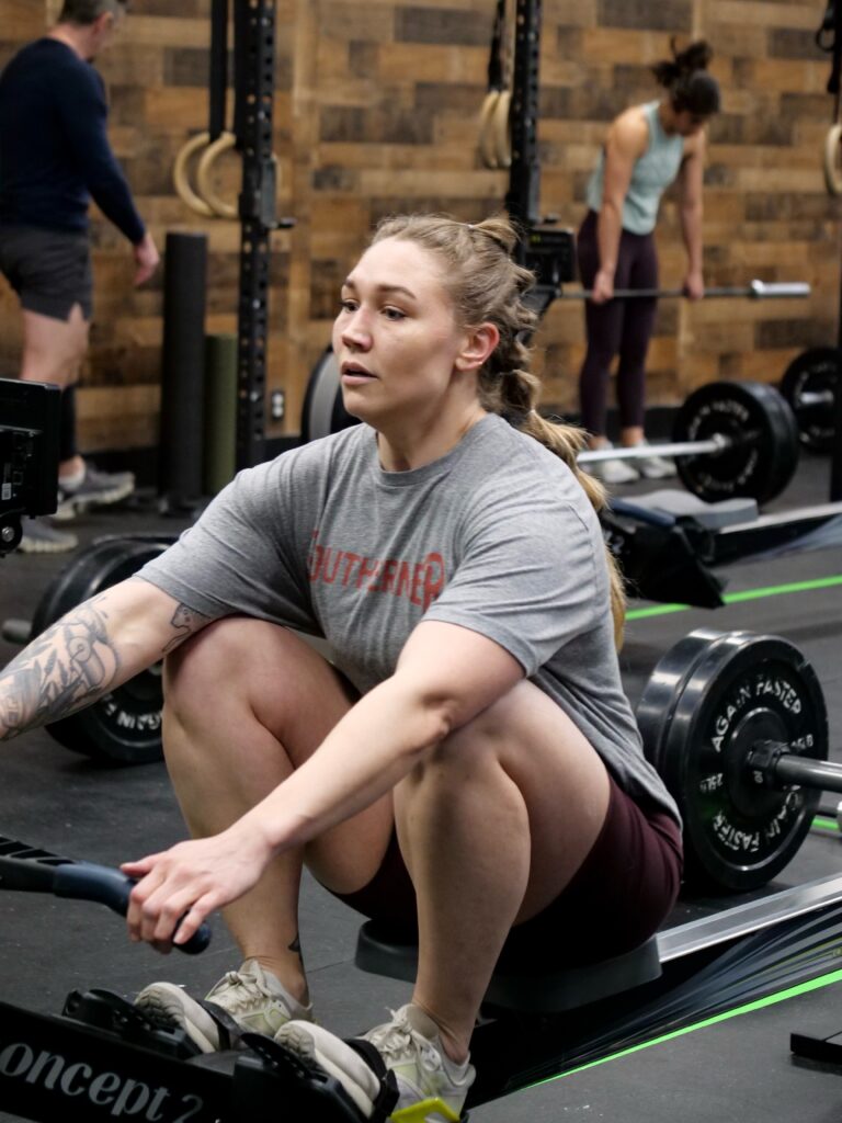 Female Athlete on Rower